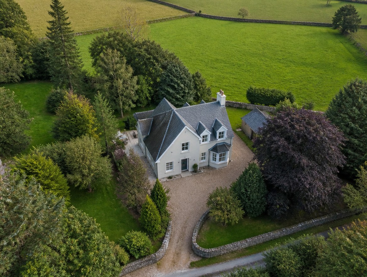 A Scottish house and its grounds seen from the air